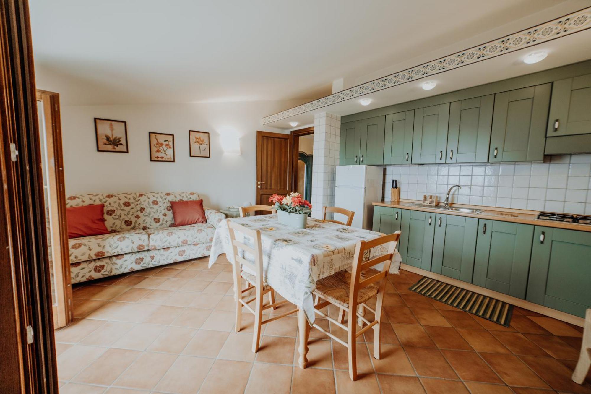 カプリオーリ Residenza Golfo Degli Uliviアパートホテル エクステリア 写真
